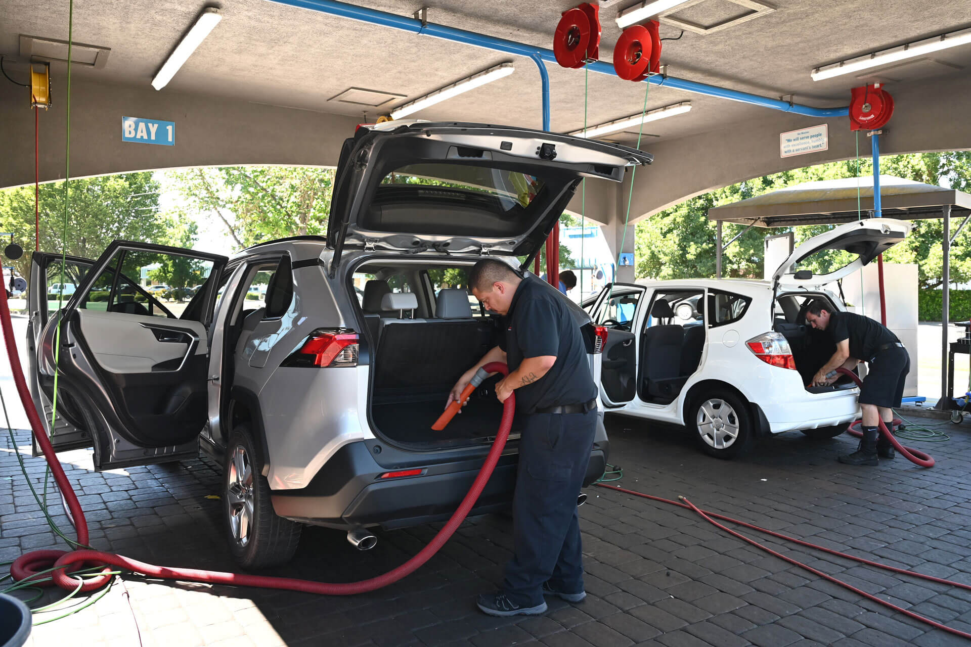 Vacuuming at Medford Center Car Wash